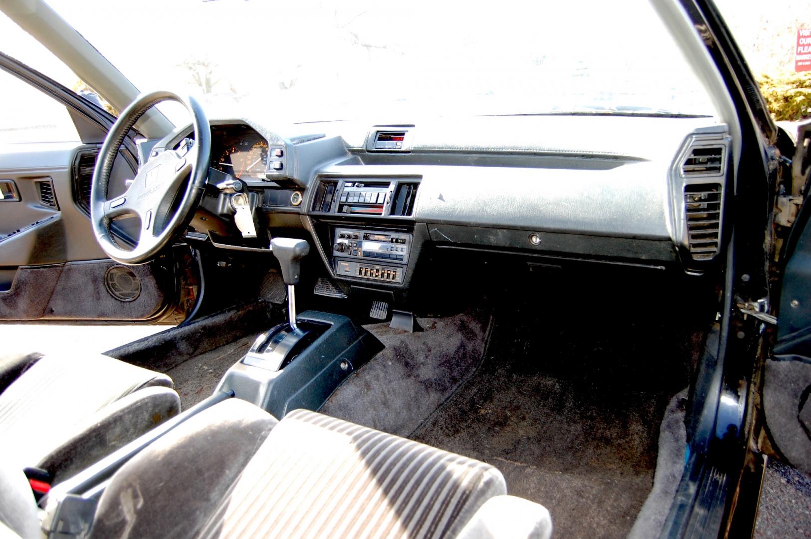 1987 Black /Gray Honda Prelude Si (JHMBA3248HC) with an 2.0L 4 cylinder engine, Automatic transmission, located at 6528 Lower York Road, New Hope, PA, 18938, (215) 862-9555, 40.358707, -74.977882 - Here we have a 1987 Honda Prelude SI with a 2.0L 4 cylinder putting power to the front wheels via an automatic transmission. Options include: gray cloth, power windows/locks/mirrors, AM/FM/TAPE radio, heat/AC, cruise control, tilt steering wheel, 13 inch alloy wheels, pop up headlights and a moon ro - Photo#17